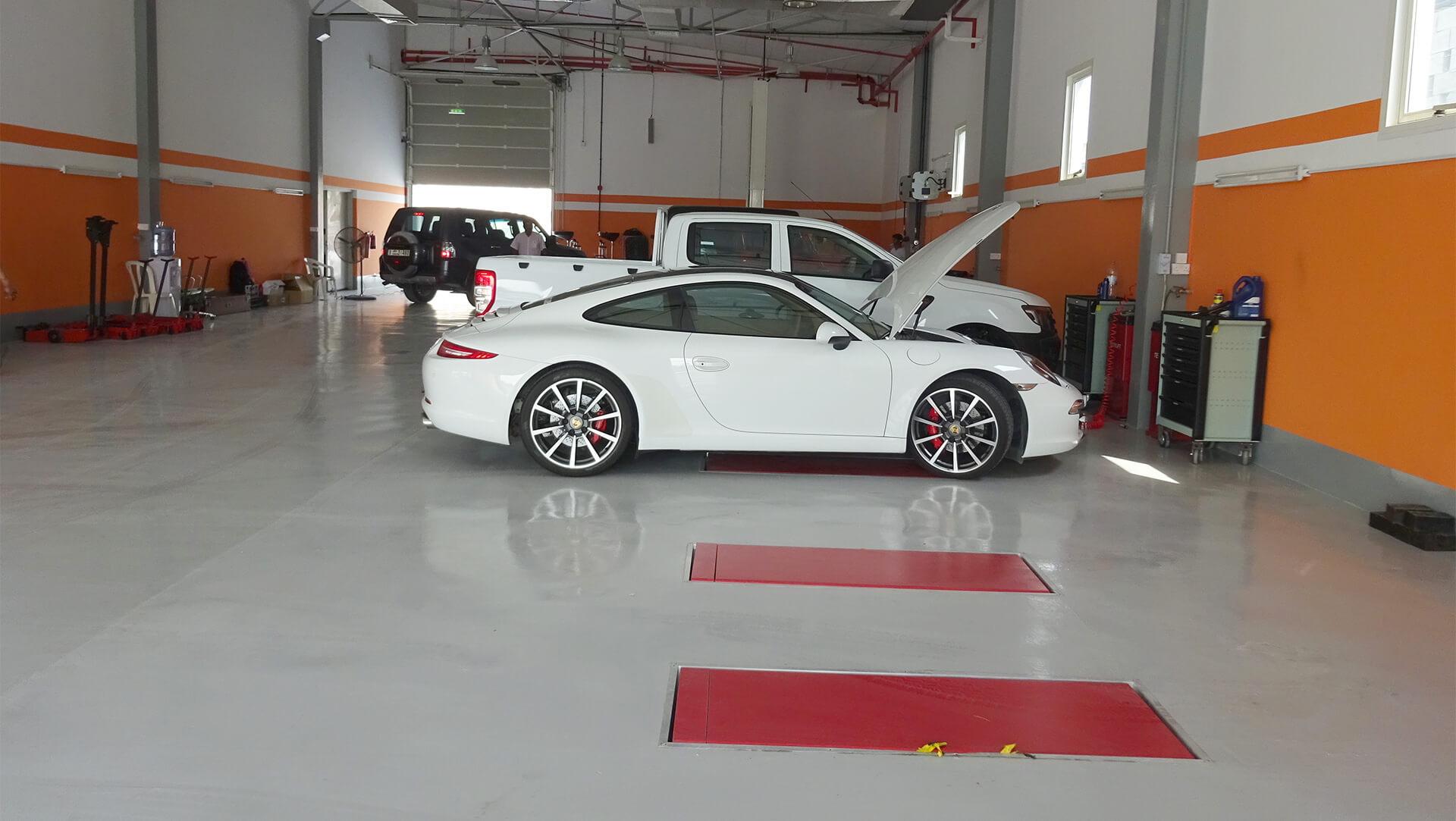 Porsche Cayenne with bonnet open at Orange Auto Dubai